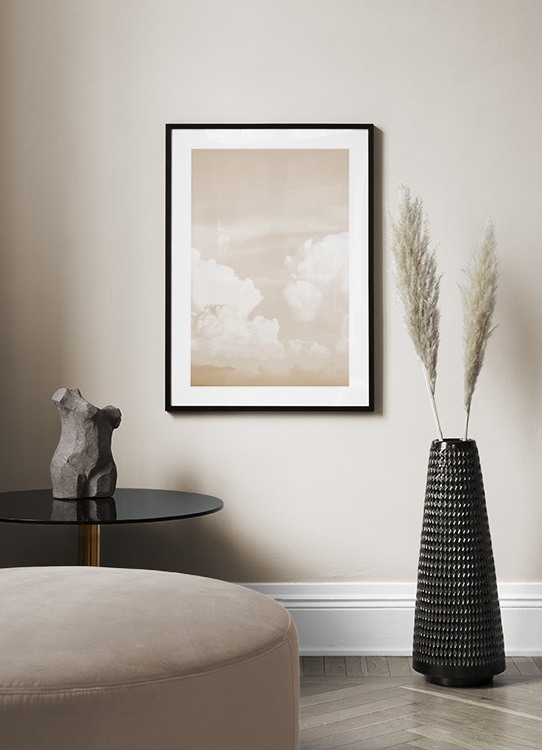  - Photographie de nuages dans un ciel de couleur pêche avec une finition pastel